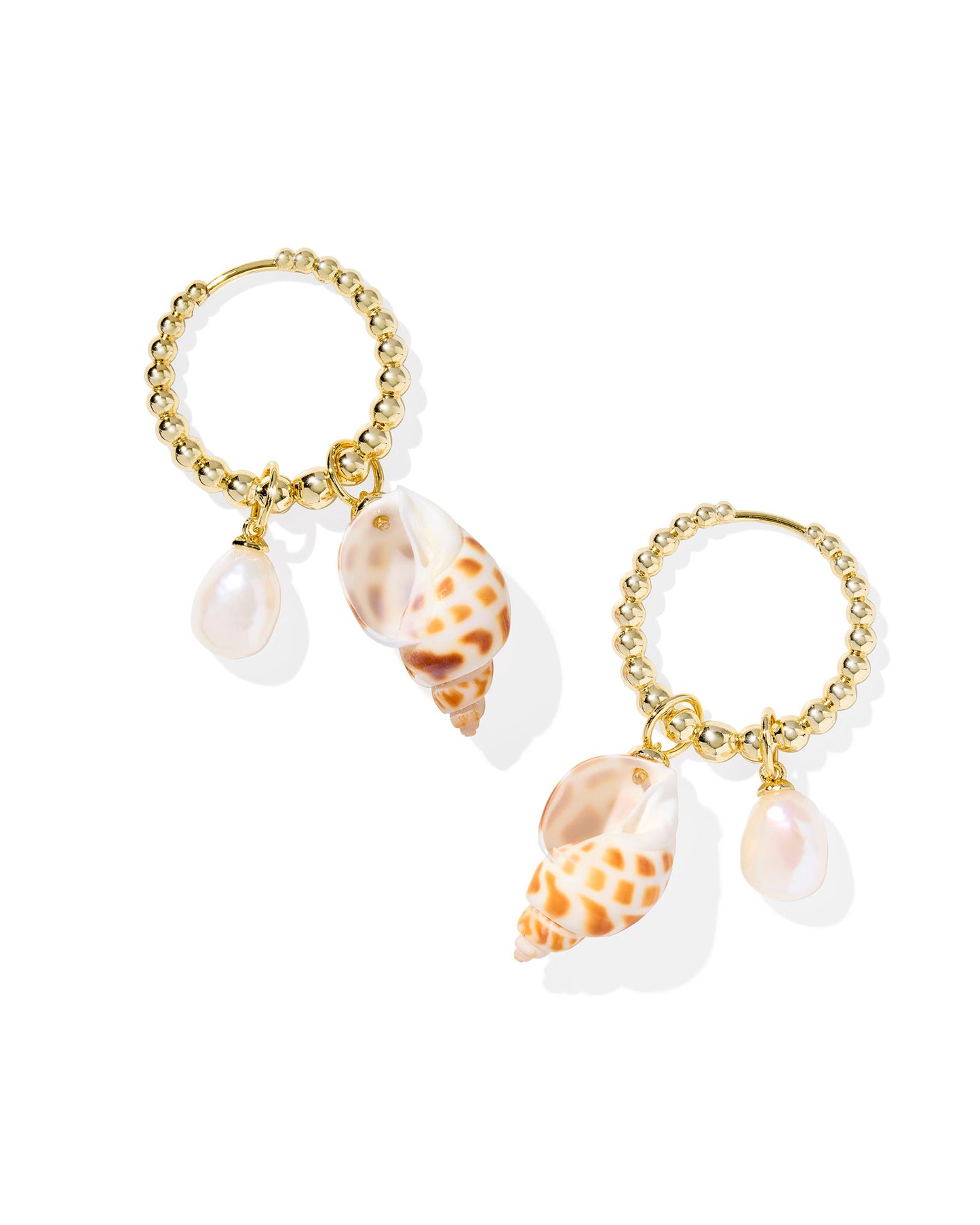 OLEANA HUGGIE EARRINGS GOLD SPOTTED SHELL