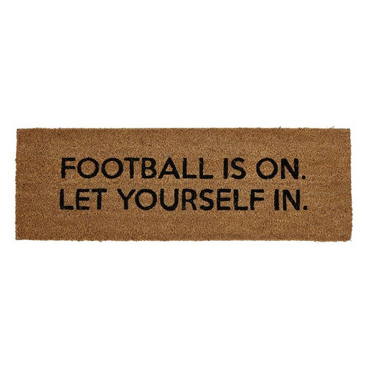 FOOTBALL IS ON DOOR MAT